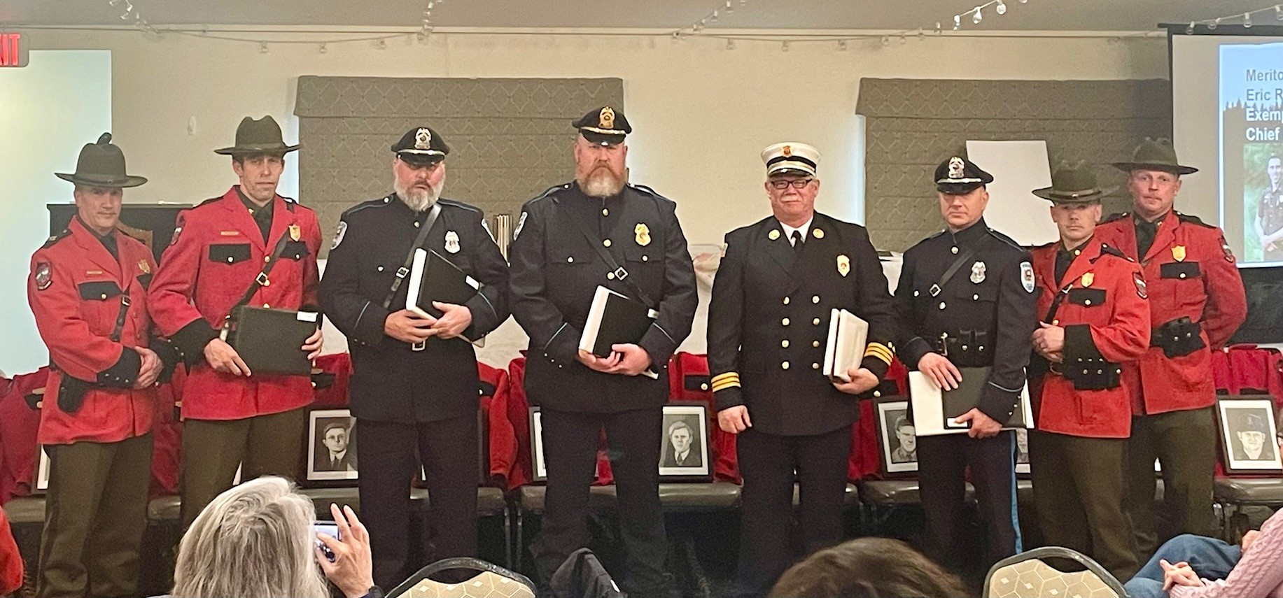 8 Men in Police, Game warden and fire fighter dress uniforms receive merit awards