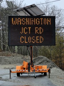 Large digital road information sigh stating Washington Junction Road Closed